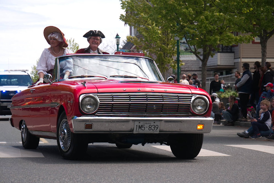 Leonard Mustard, town crier, rides in the Qualicum Beach Family Day parade on May 29, 2022. (Kevin Forsyth photo)