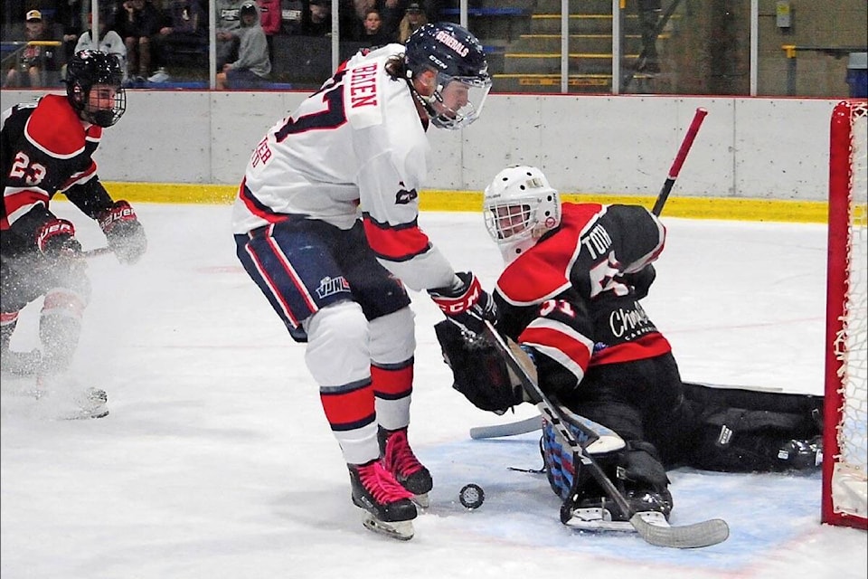 Oceanside Generals Brady O’Brien gets his shot blocked by the pad of Port Alberni Bombers goalie Lukas Toth during their VIJHL game at Oceanside Place, Sept. 9. (Michael Briones photo)