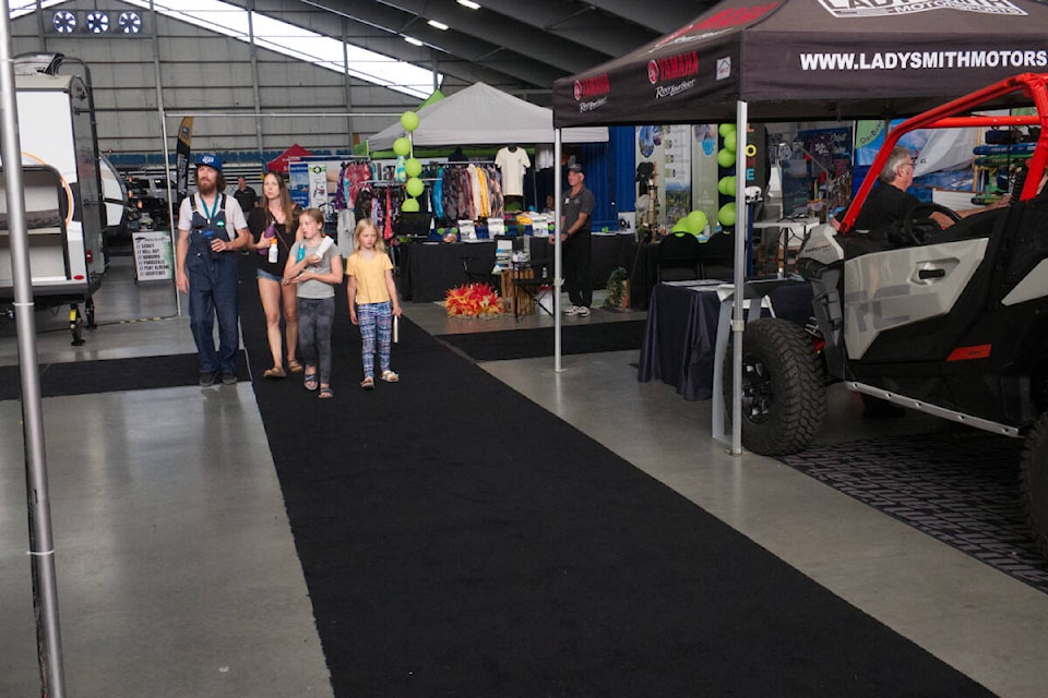 The Morrison family checks out the final day of the first-ever Vancouver Island Outdoor Adventure and Motor Show. The event ran from Sept. 9 to Sept. 11 at Arbutus Meadows Event Centre in Nanoose Bay. (Kevin Forsyth photo)