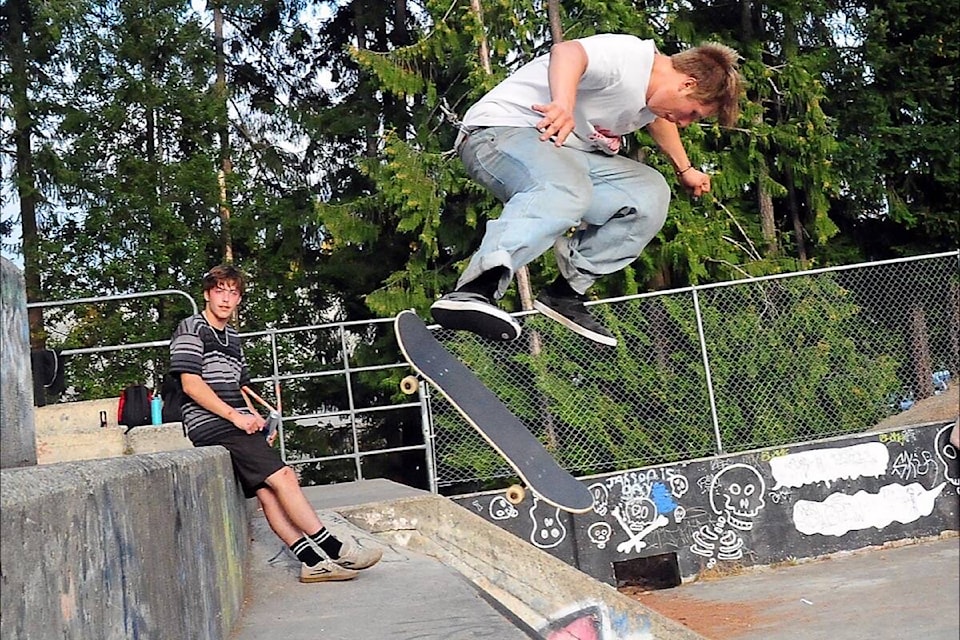 Dylan Bogel soars high for a difficult move. (Michael Briones photo)