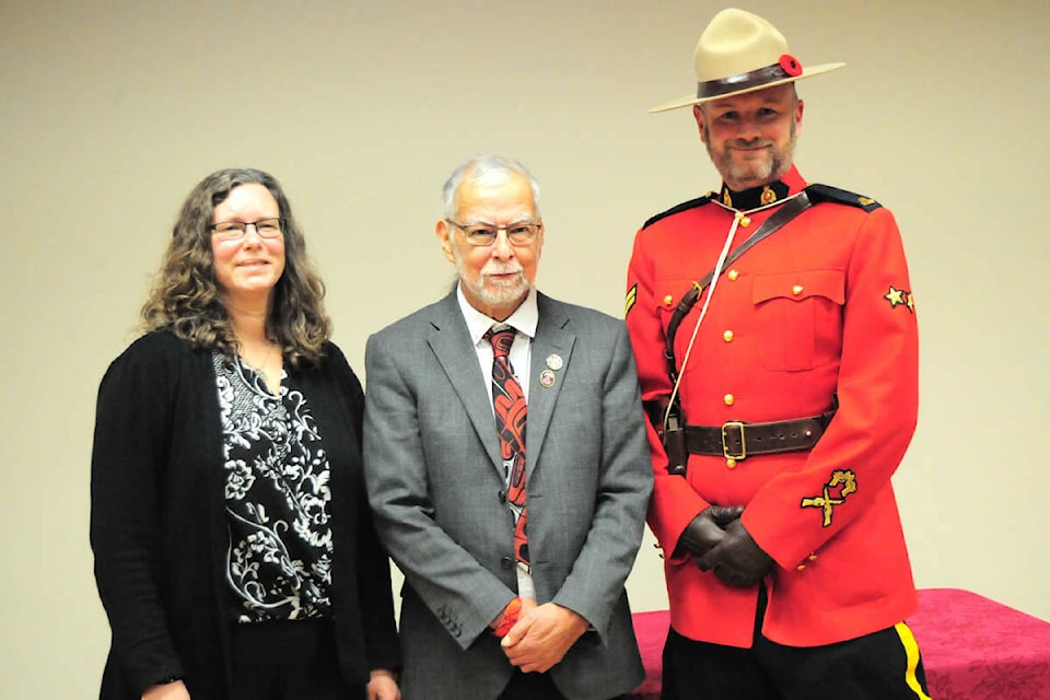 Regional District of Nanaimo board chair Vanessa Craig, left, welcomes Qualicum First Nation Chief Michael Recalma as alternate director of Electoral Area H, with Cpl. Mike Kane of the Oceanside RCMP. (Michael Briones photo)