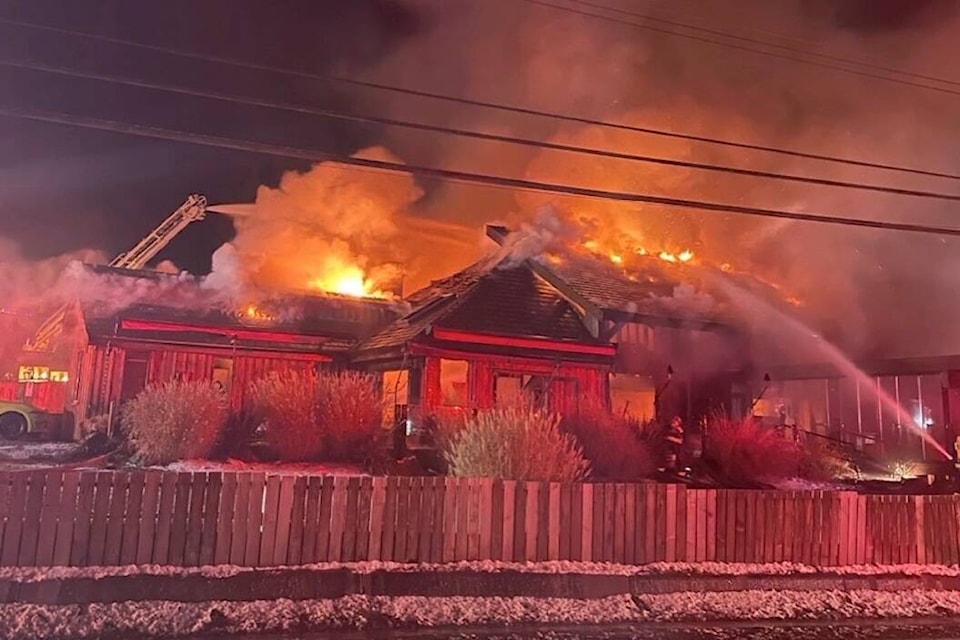 Volunteer firefighters tackle a massive blaze at Tofino’s Shelter Restaurant in the early morning of Dec. 22, 2022. (Bryanne Wiebe photo)