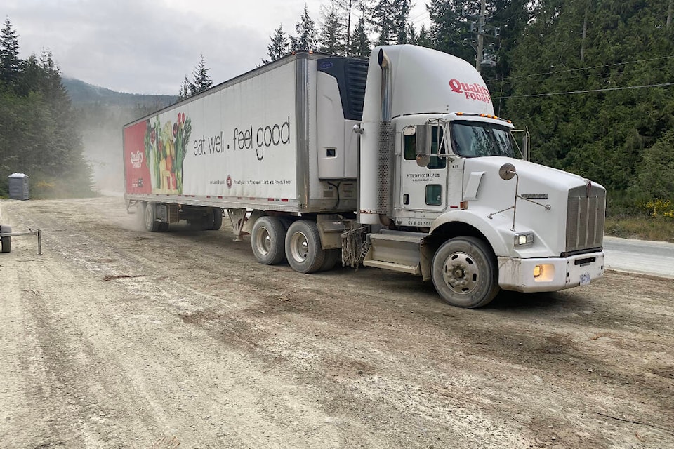 A food truck belonging to Quality Foods drives ailong the detour route between Lake Cowichan and Port Alberni to deliver goods on Friday, June 9, 2023. (B.C. MINISTRY OF TRANSPORTATION PHOTO)