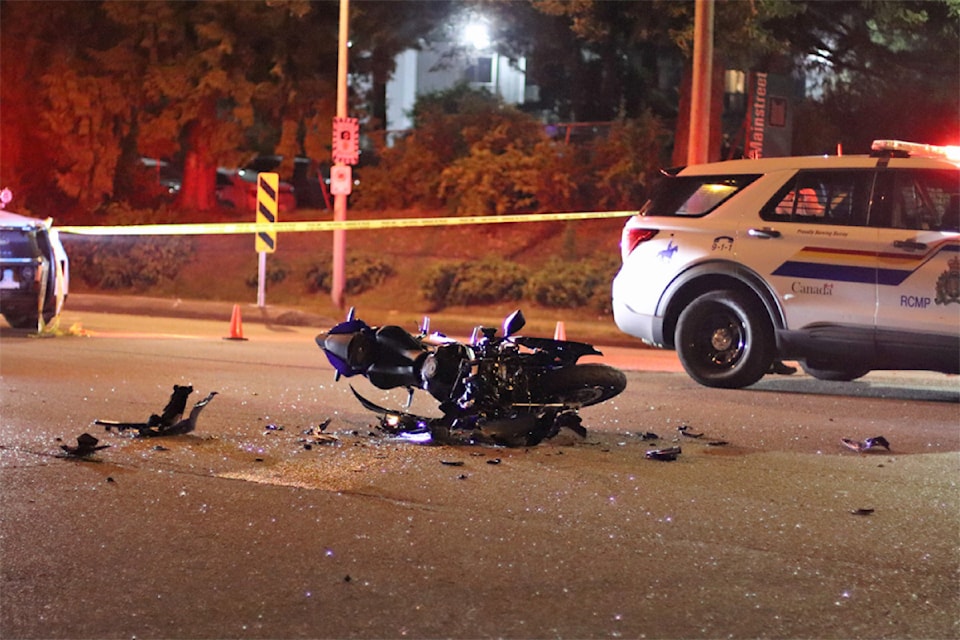 One person was taken to hospital after a crash between a motorcycle and a car in Surrey Tuesday night (Aug. 20).