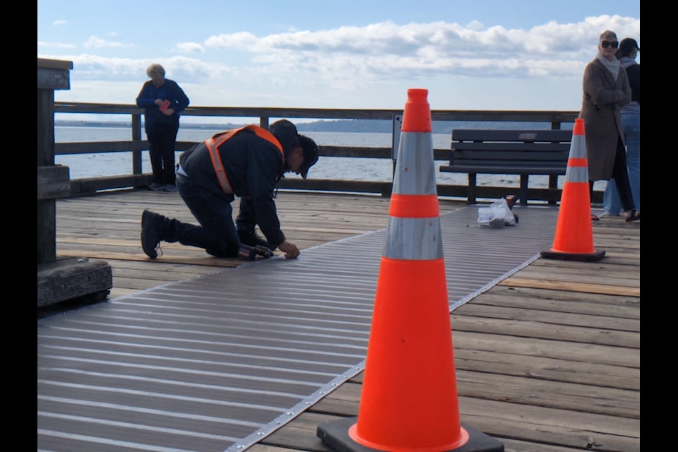 Workers began installation of the accessibility mat at White Rock pier on Tuesday morning. Installation is expected to be complete by Friday (Aug. 30) morning, with a city ribbon-cutting event scheduled for 11 a.m.