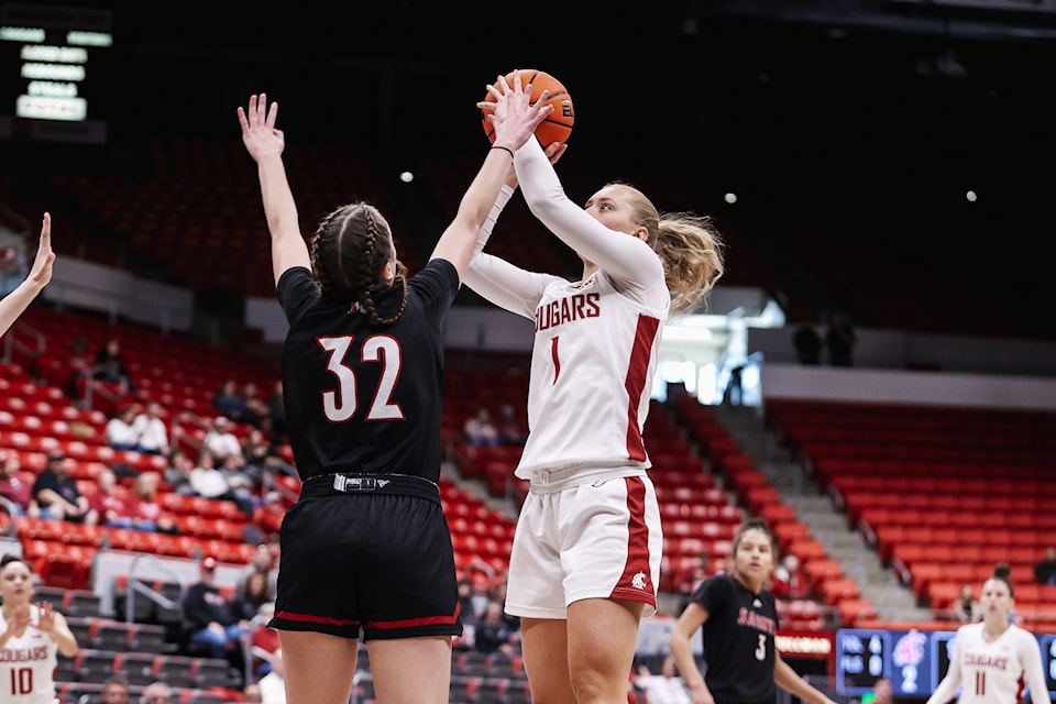 Tara Wallack, a Semiahmoo Secondary graduate, scoring her 1,000th point with the Washington State University Cougars on Sunday, Dec. 15.