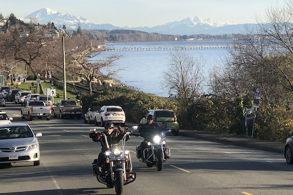 Craig Binion says the two motorcycles in the foreground of this photo – taken from west Marine Drive, looking east –  'represent freedom and independence and the wild west and compliment the qualities of the ocean and the mountains.'
