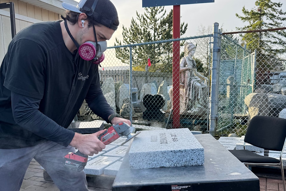 Stefan Vukovic finishes the last of Stonemarks' 2024 memorial markers on Christmas Eve. (Contributed photo)