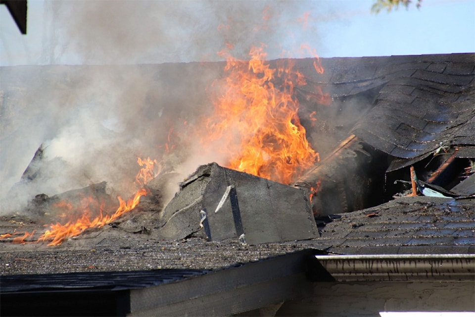 Surrey firefighters battled a blaze at a two-storey house in Newton Sunday night.