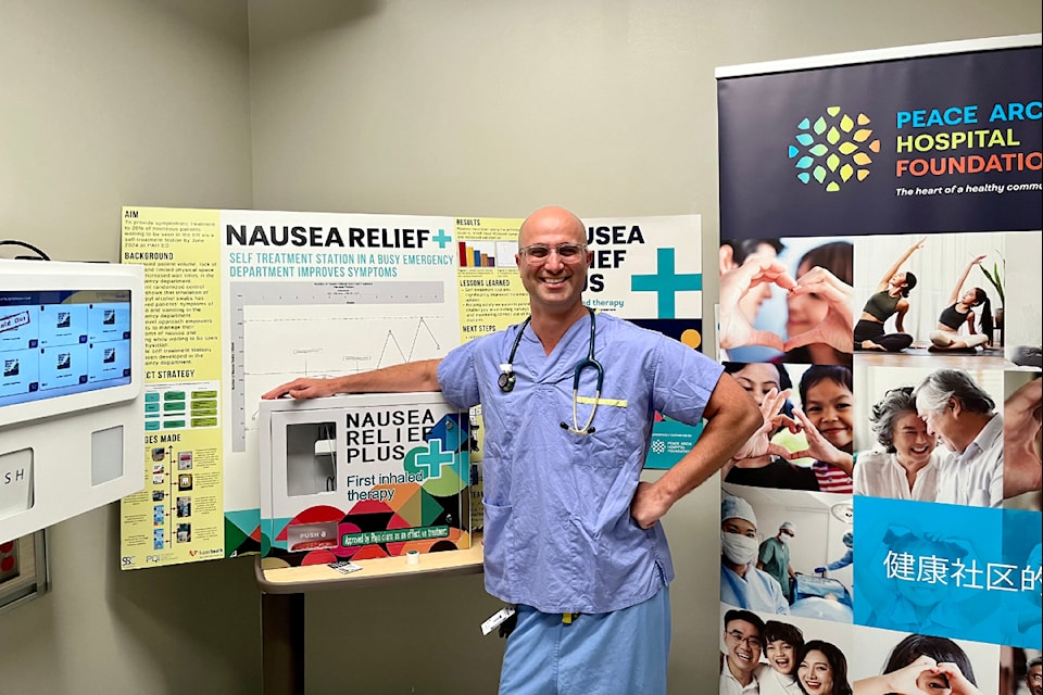 Dr. Amir Behboudi with two of the new treatment vending machines at Peace Arch Hospital in White Rock.