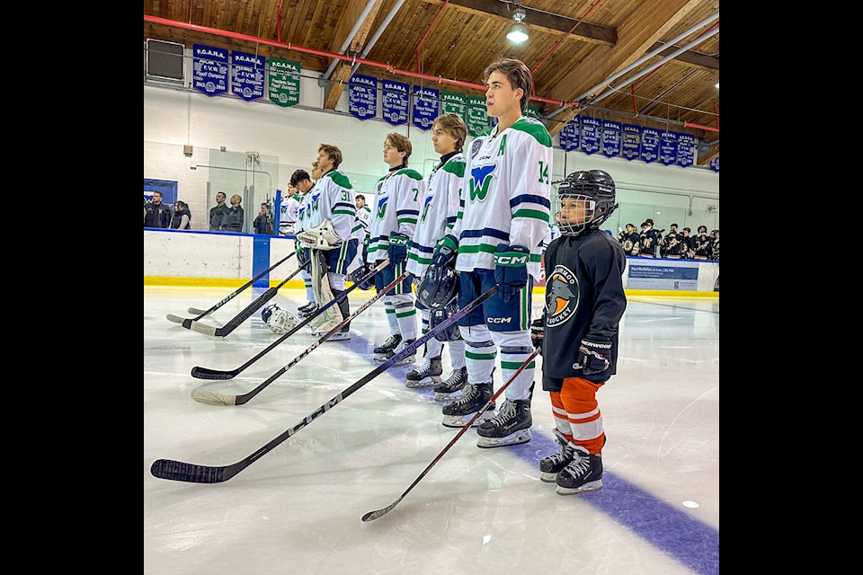 Semiahmoo Ravens Minor Hockey U9 "seventh skater" Austin Rocha joins White Rock Whaler players for the national anthem at a Sept. 15 game.

 