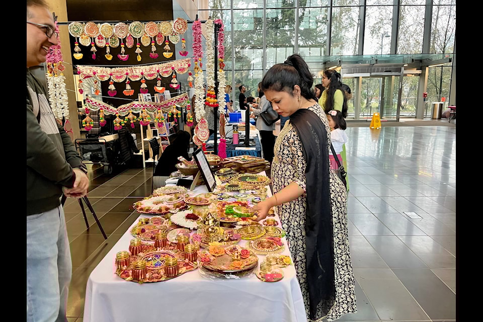 Shamila checks out the Tasselskart booth at Diwali celebrats at Surrey City Hall Sunday (Oct. 20). 