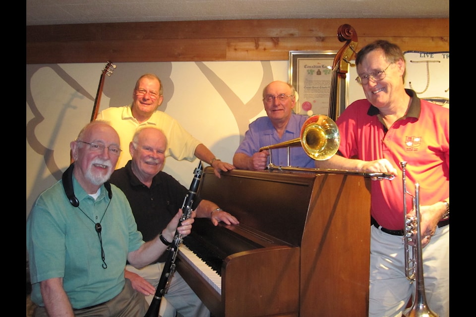 Bill Dixon with other members of the Crescent City Shakers, including Gerry Green (left) and Jim Armstrong (right).                               