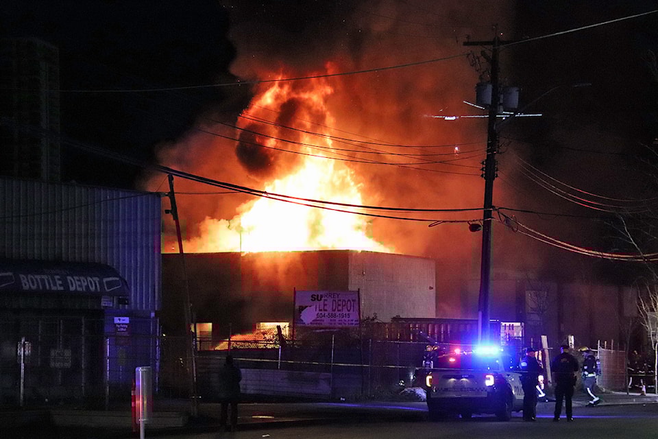 Surrey firefighters battle a blaze at a strip mall Wednesday night (Jan. 1).