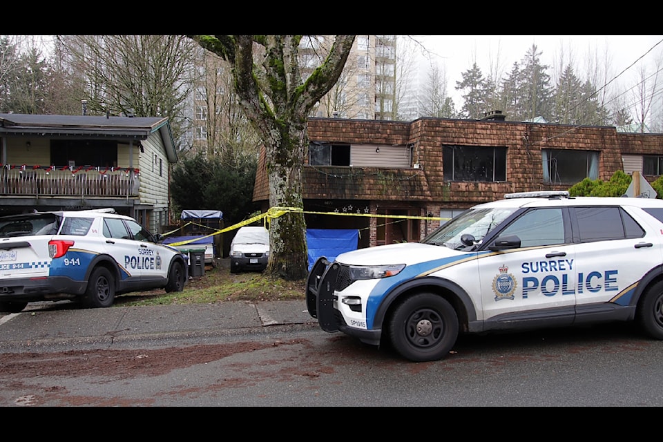 Integrated Homicide Investigation Team officers have taken conduct of an investigation after Surrey firefighters found a dead man inside a house fire.