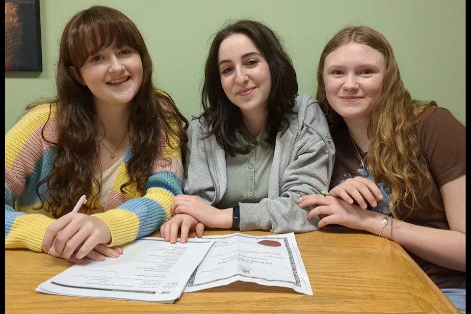 Playful Palette Foundation co-founders (left to right) Sabine Lapointe, Hanna Hakak and Lucy Prior go over plans for their upcoming variety show at Oceana PARC Playhouse on Saturday, Jan. 18. 