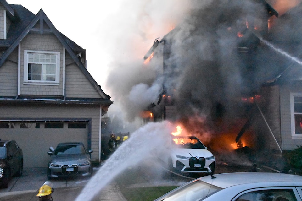 Surrey fire crews battle a blaze at a home in Cloverdale Monday (June 2) night. 
