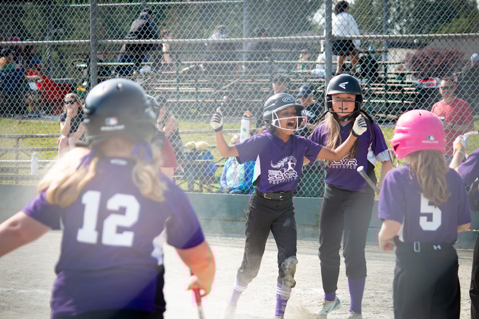 The South Surrey White Rock Minor Softball Association's U11C Purple Bashers win gold in a thrilling 7-6 victory over the Cloverdale Lightning Sunday (June 15). 
