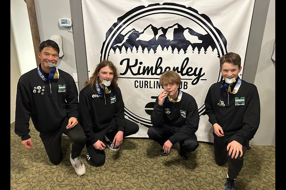  Earl Marriott Secondary School's Nathan Wayman, left, Sawyer Van Hulsentop, Ruben Deefholts, and Owen Lowe with their silver medals at provincials in Kimberley.