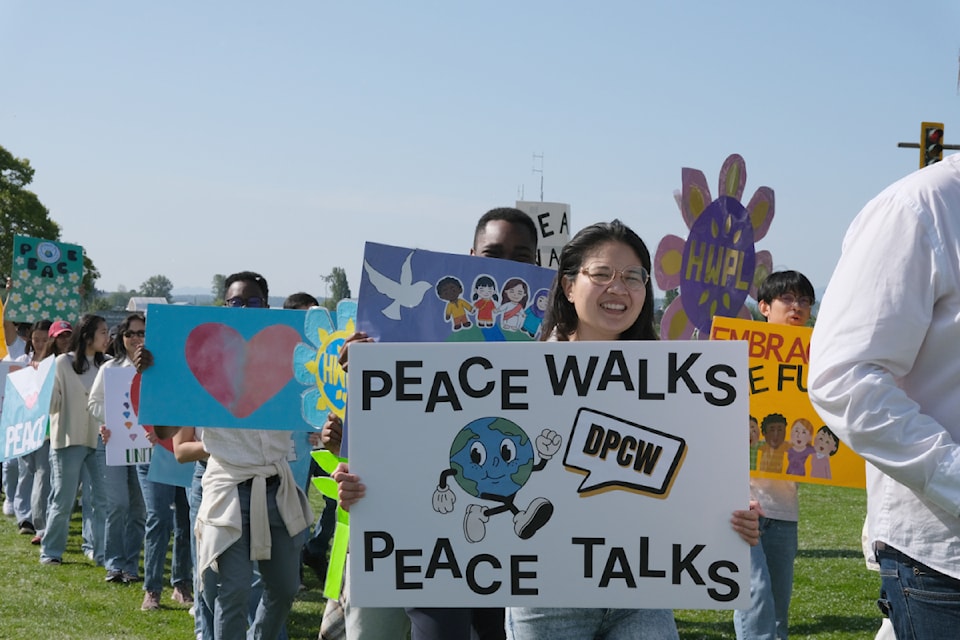 Participants of a May 24, 2025 Peace Walk shared messages of peace, unity and action on handmade signs.