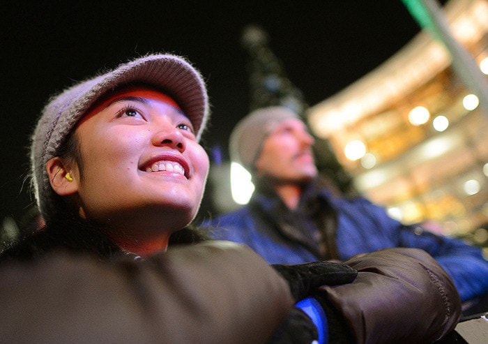 Christine Orosa waits for the lighting of the tree.
BOAZ JOSEPH / THE LEADER