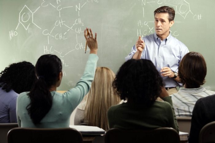 Chemistry Teacher with Students in Class