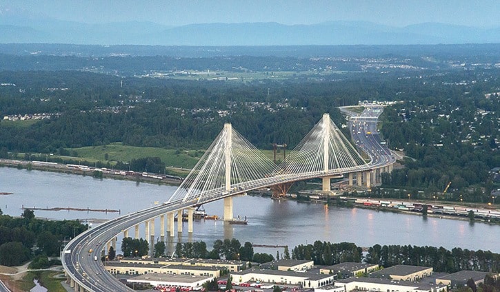 Canada, BC, Vancouver. Aerial photos of Port Mann Bridge after sunset.