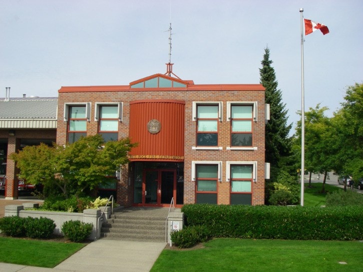 Exterior of the White Rock Fire Hall - plus the City of White Rock logo