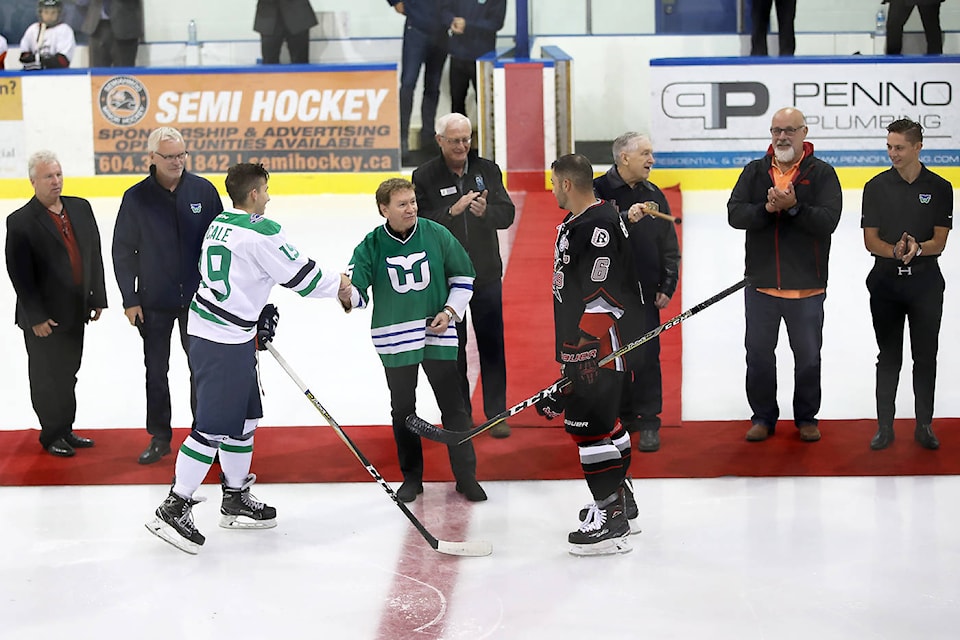 13520398_web1_WRWhalers-GarrettPuckdrop