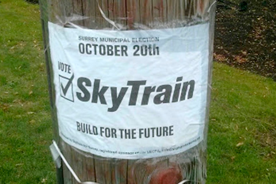 13833124_web1_181004-SUL-SkyTrain-Election-Sign