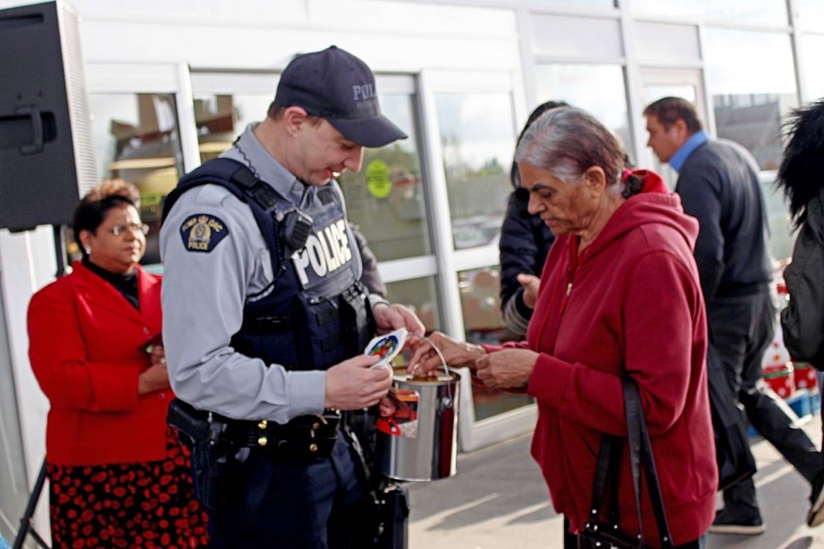 14594926_web1_181201-SNW-M-SurreyRCMP-KeianToyDrive-donation-lc-dec1