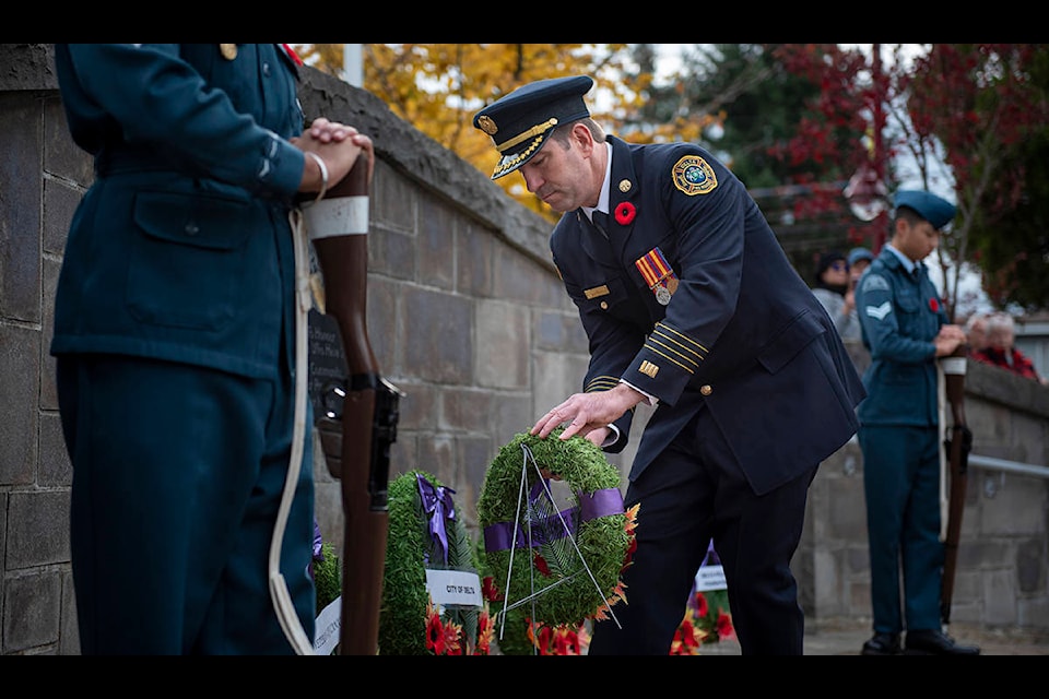 Deputy fire chief Michel Latendresse lays a wreath during Remembrance Day in North Delta on Nov. 11, 2019. Hundreds gathered at the North Delta Social Heart Plaza to pay respect to those who made the ultimate sacrifice in service of their country. (Ryan-Alexander McLeod photo)