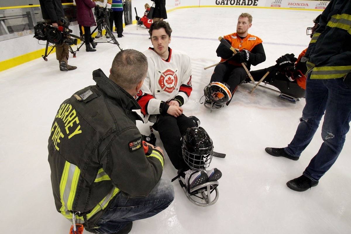 20385751_web1_200205-SUL-Sledge-hockey-game_1