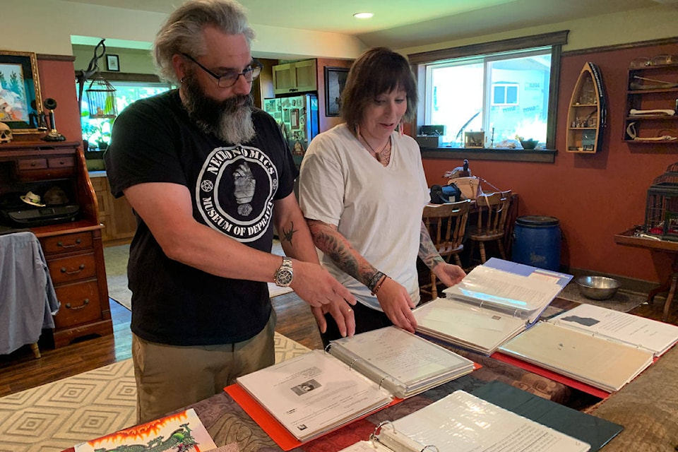 Joshua and Weyla Roy display some of the many letters they have from serial killers like Robert Pickton and Dennis Rader, the BTK killer. (Shalu Mehta/News Staff)