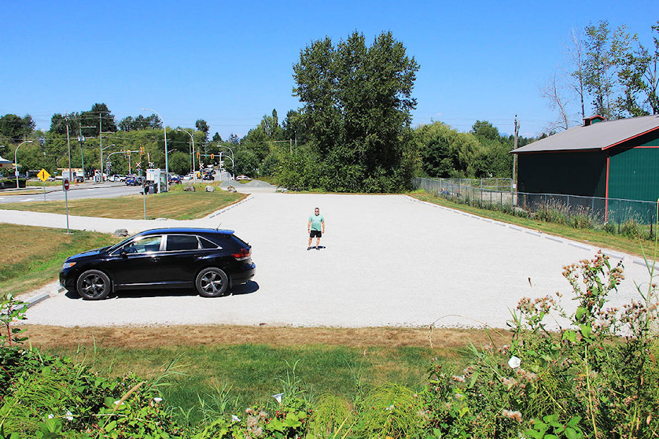 Michael Gibbs stands in a new parking lot at Sullivan Park. Gibbs says the new lot opens up more usage possibilities for the park. (Photo: Malin Jordan)