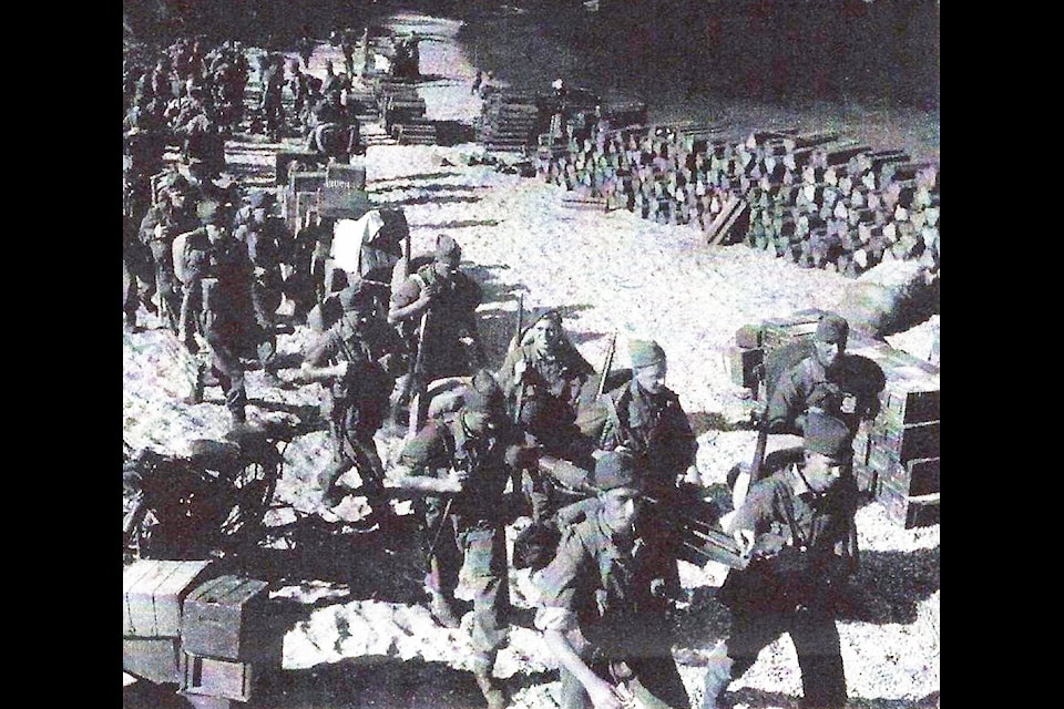 Royal Marines of No. 40 Commando leave Sugar Beach in Albania in October, 1944. (Image courtesy Reginald Wise)