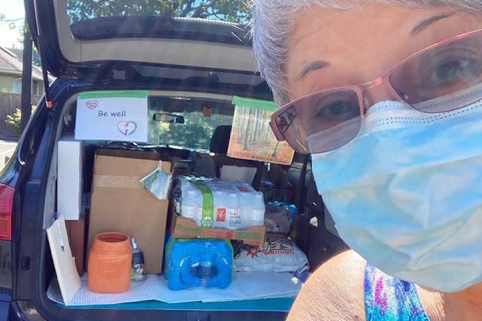 Patricia Mulvaney received enough donations of water and other drinks to fill her van to the hilt Tuesday (June 29, 2021). The fluids were delivered to Surrey Urban Mission Society. (Contributed photo)