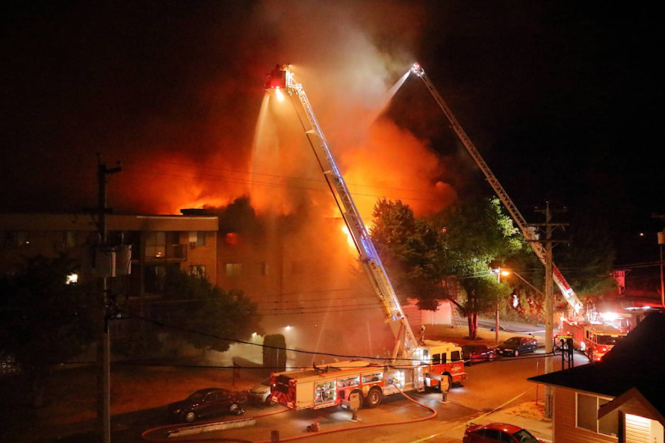 Chilliwack firefighters tackle a blaze at an apartment fire on Hazel Street in Chilliwack in the early hours of July 29, 2021. (Eric Buermeyer photo)