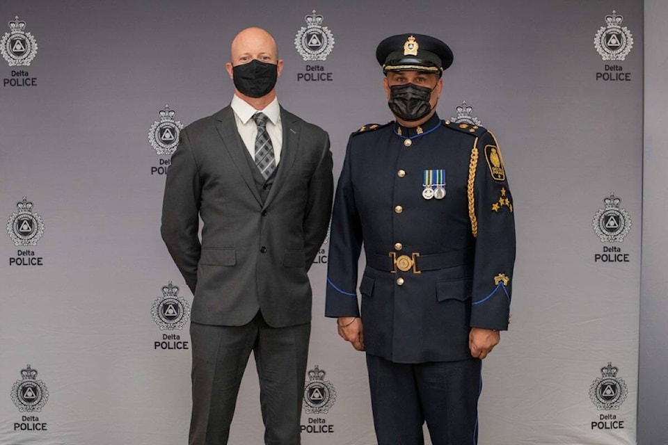 Deputy Chief Harj Sidhu (right) with Deputy Chief Constable Commendation recipient Const. Steven Vickery at the 2021 Delta Police Awards ceremony on Thursday, Oct. 28. (Delta Police Department photo)
