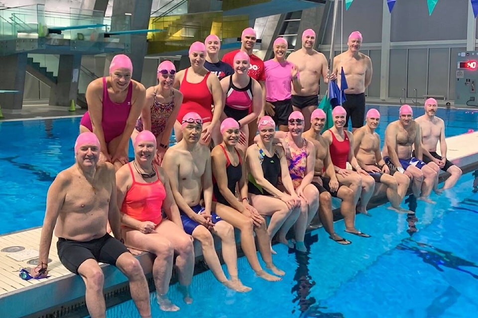 As others don pink t-shirts for anti-bullying day (Feb. 23), swimmers across British Columbia – including White Rock Wave’s Thursday-night swimmers and coaches – are wearing pink caps as part of an initiative set up by Swim BC. (Contributed photo)