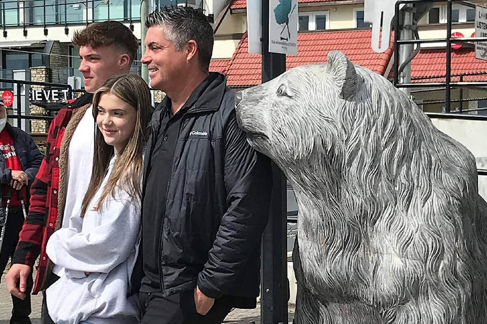Cory Slavin with his son Tristan and daughter Jenna-Lee stand next to the new Grizlee at the May 14, 2022 unveiling. (Contributed photo)