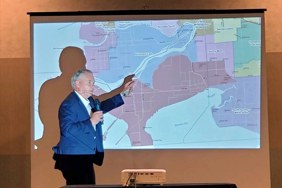 Delta Mayor George Harvie argues against proposed federal electoral boundary changes that would see Delta split into three ridings during a public hearing at the Coast Tsawwassen Inn on Thursday, June 9, 2022. (James Smith photo)