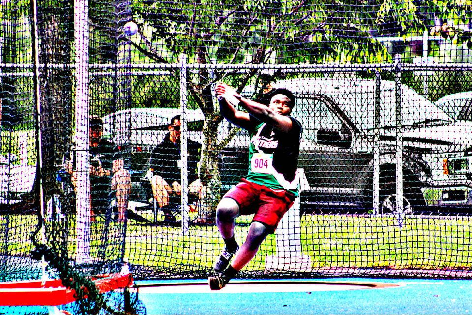 Michael Ogbeiwi is seen competing in the hammer throw at McLeod Stadium in Langley June 10 in this stylized image. (Photo: Malin Jordan)