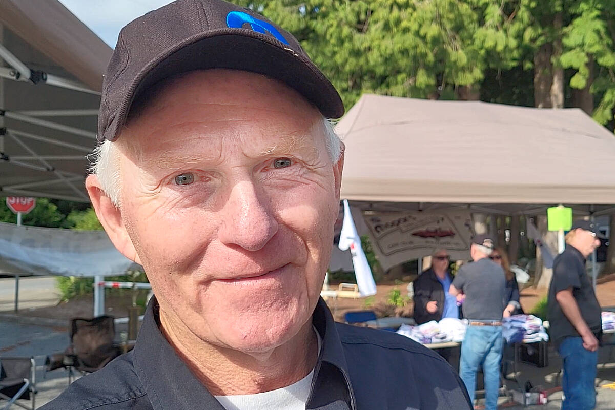 Mopars Unlimited Car Club president Garry Keay announced they have raised $10,000 for Ukraine humanitarian relief at the 29th edition of the Mopar Madness car show in Langley on Sunday, July 10. (Dan Ferguson/Langley Advance Times)