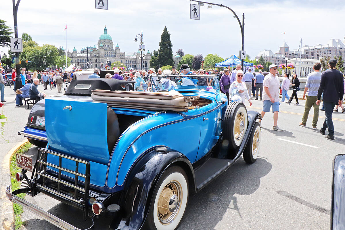 A beautifully restored 1932 Ford sits parked in front of the Fairmont Empress Hotel during Northwest Deuce Days show and shine on Sunday. (Don Descoteau/News Staff)