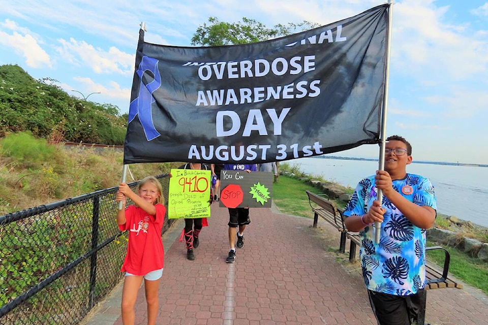 The city of White Rock gathered for a walk around East Beach on Overdose Awareness Day. (Photo courtesy of Christy Fox)