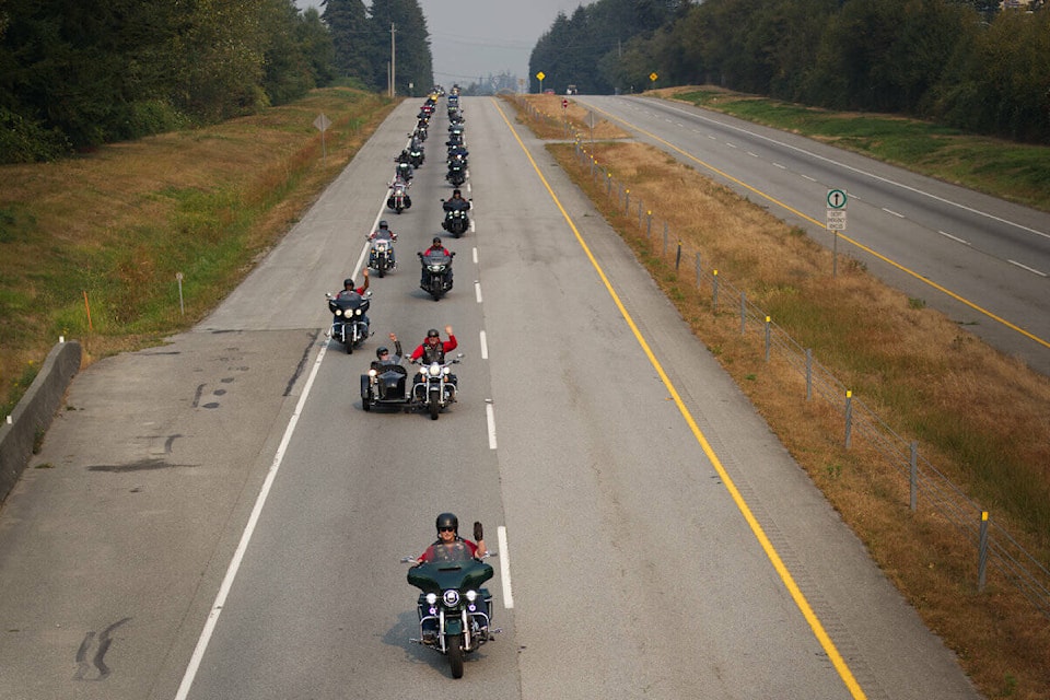 First responders and their supporters make their way south along Highway 99 to Peace Arch Park. In the years since the Sept. 11, 2001 terror attacks, the park has served as a place for Canadians and Americans to gather and remember the lives lost in New York, Washington DC and Pennsylvania. (Geoff Yue photo)