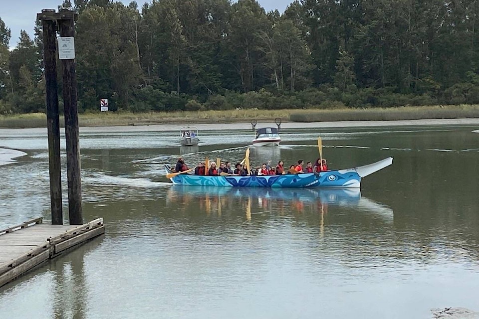 The Delta School District’s new journey canoe Wave Warrior pulls into Captain’s Cove at the mouth of the Deas Slough during its maiden voyage on Friday, Sept. 23, 2022. (Delta School District photo)
