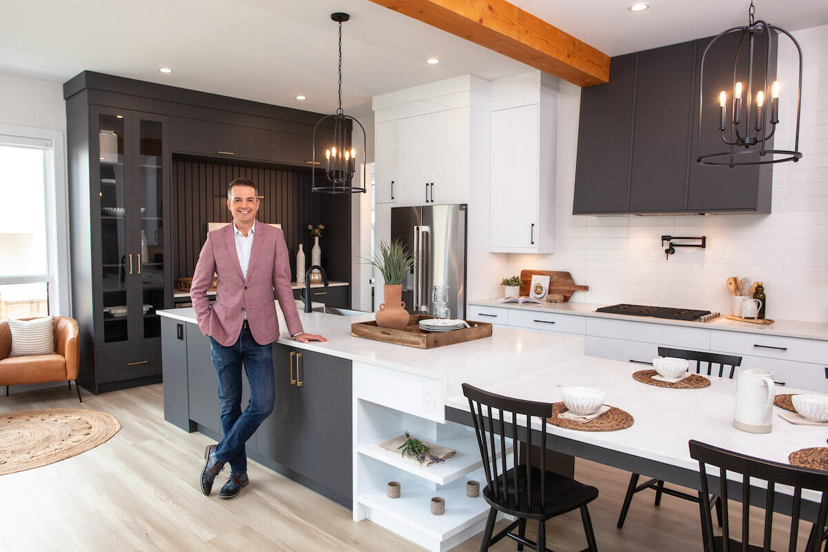 Millionaire Lottery spokesperson Todd Talbot stands in the $3.2 million Langley house that is one of the top prizes in this years draw. (Special to Langley Advance Times)