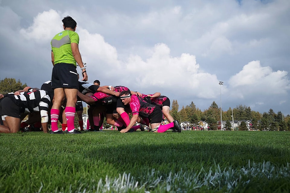 The Surrey Beavers scrum down against Abbotsford in the Beavers’ annual “Ruck for the Cure” game Oct. 22 at Sullivan Heights Park. The club played two matches against Abbotsford and one match against Richmond as part of their annual cancer-research fundraiser. After the games, the Beavers raised more than $16,500 for cancer research. (Photo submitted: Brett Craig)